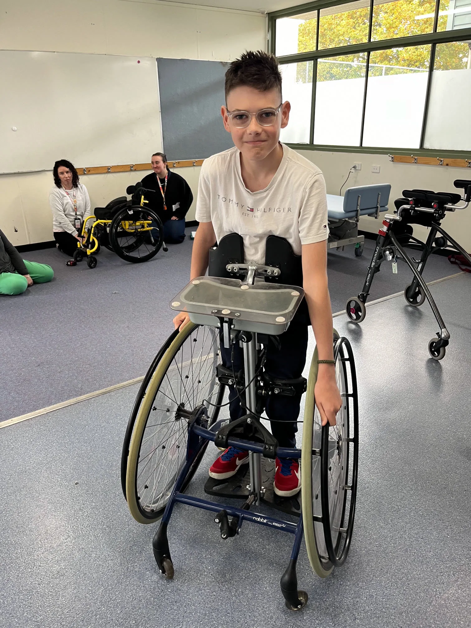 Participant using a standing frame during an activity